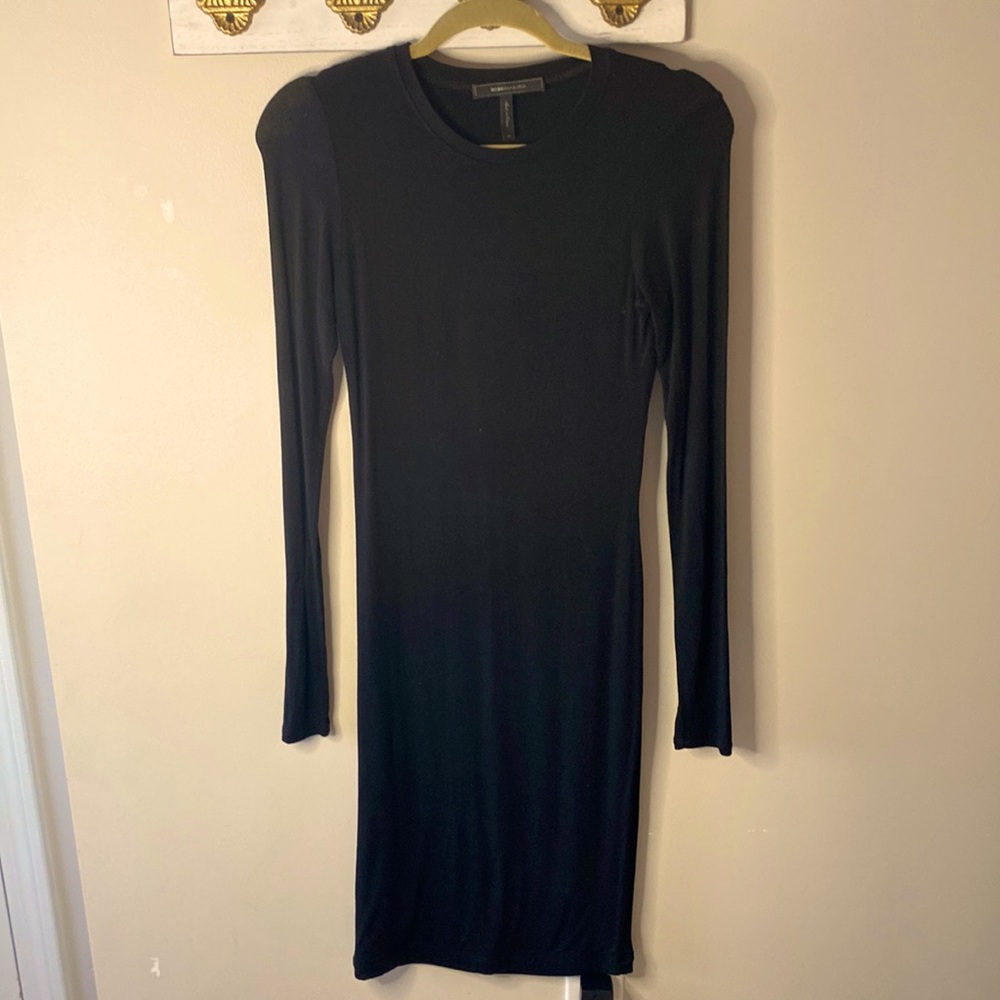 Long sleeve form fitting black dress